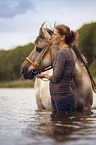 Woman with fjord horse