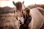 woman and Fjord horse