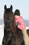 girl with Frisian horse