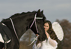 angel and friesian horse