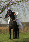 angel and friesian horse