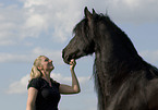 woman with Frisian Horse