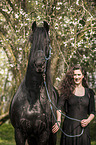woman and Frisian Horse