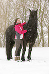 young woman with Frisian Horse