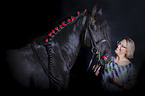 Friesian Horse with a woman