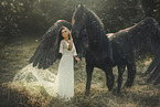 young woman and Frisian horse