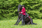 woman with Friesian horse