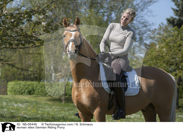 woman rides German Riding Pony / NS-06448