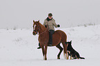 woman rides pony