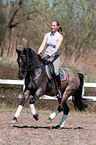 woman rides pony