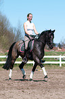 woman rides pony