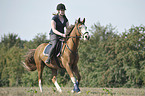 woman rides pony