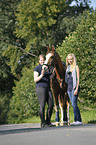 women with pony