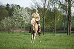 girl rides pony