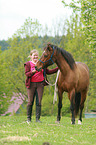 woman and German Riding Pony