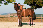 woman and German Riding Pony