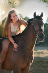 woman and German Riding Pony