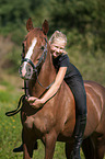 German Riding Pony with woman