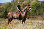 German Riding Pony with woman