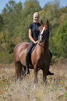 German Riding Pony with woman