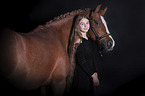 young woman with German Riding Pony