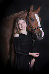 young woman with German Riding Pony