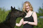 young woman with foal