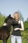 young woman with foal