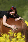 woman rides warmblood