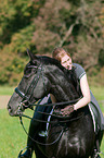 woman and German Sport Horse