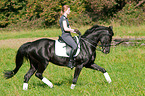 woman rides German Sport Horse