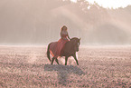 woman and German Sport Horse