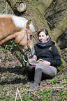 woman and haflinger horse