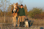 woman with dog and horse