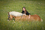 woman and Haflinger horse