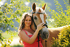 woman and Haflinger horse