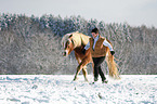 woman and Haflinger horse