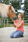 woman and Haflinger