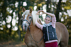 Haflinger with woman