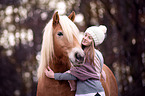 Haflinger with woman