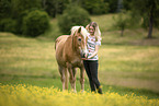 woman and Haflinger