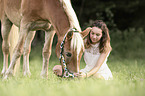 woman and Haflinger