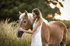 woman and Haflinger