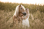 woman and Haflinger