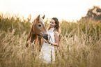 woman and Haflinger