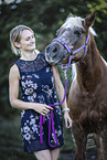 young woman with Haflinger