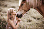 woman and Haflinger horse