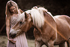 woman and Haflinger horse