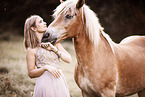 woman and Haflinger horse