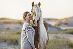 woman and Haflinger horse